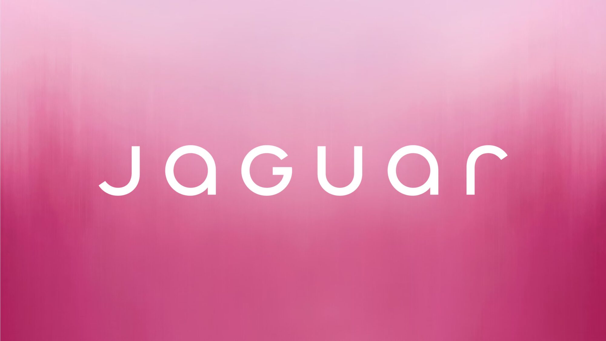 Neue Jaguar Wortmarke in Weiß auf pink-violettem, verlaufendem Hintergrund